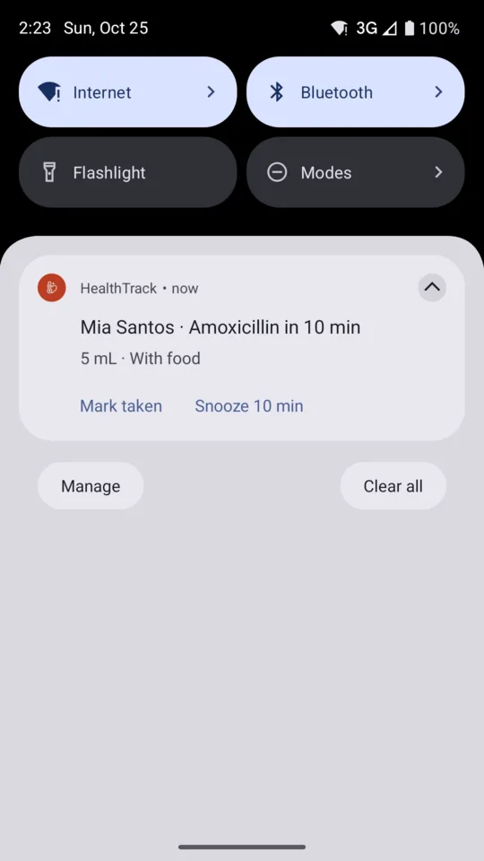 A dose reminder notification with Mark taken and Snooze actions
